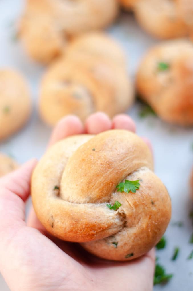 Close up of garlic knot in hand