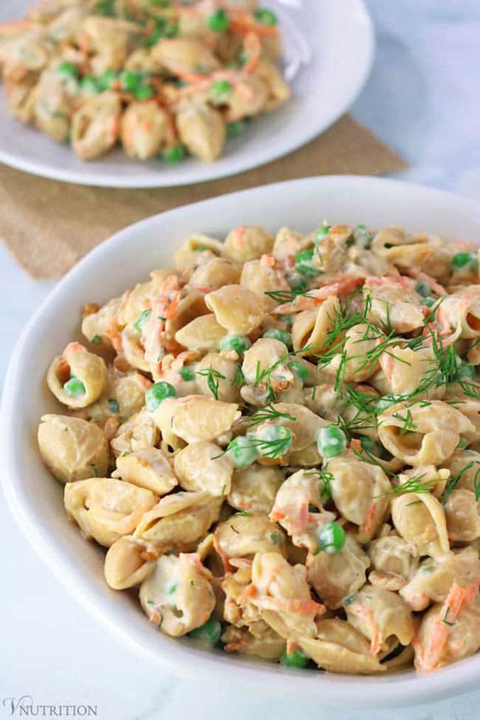Close up of pasta salad in white bowl