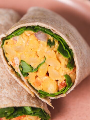 Close up of curry chickpeas in a wrap.