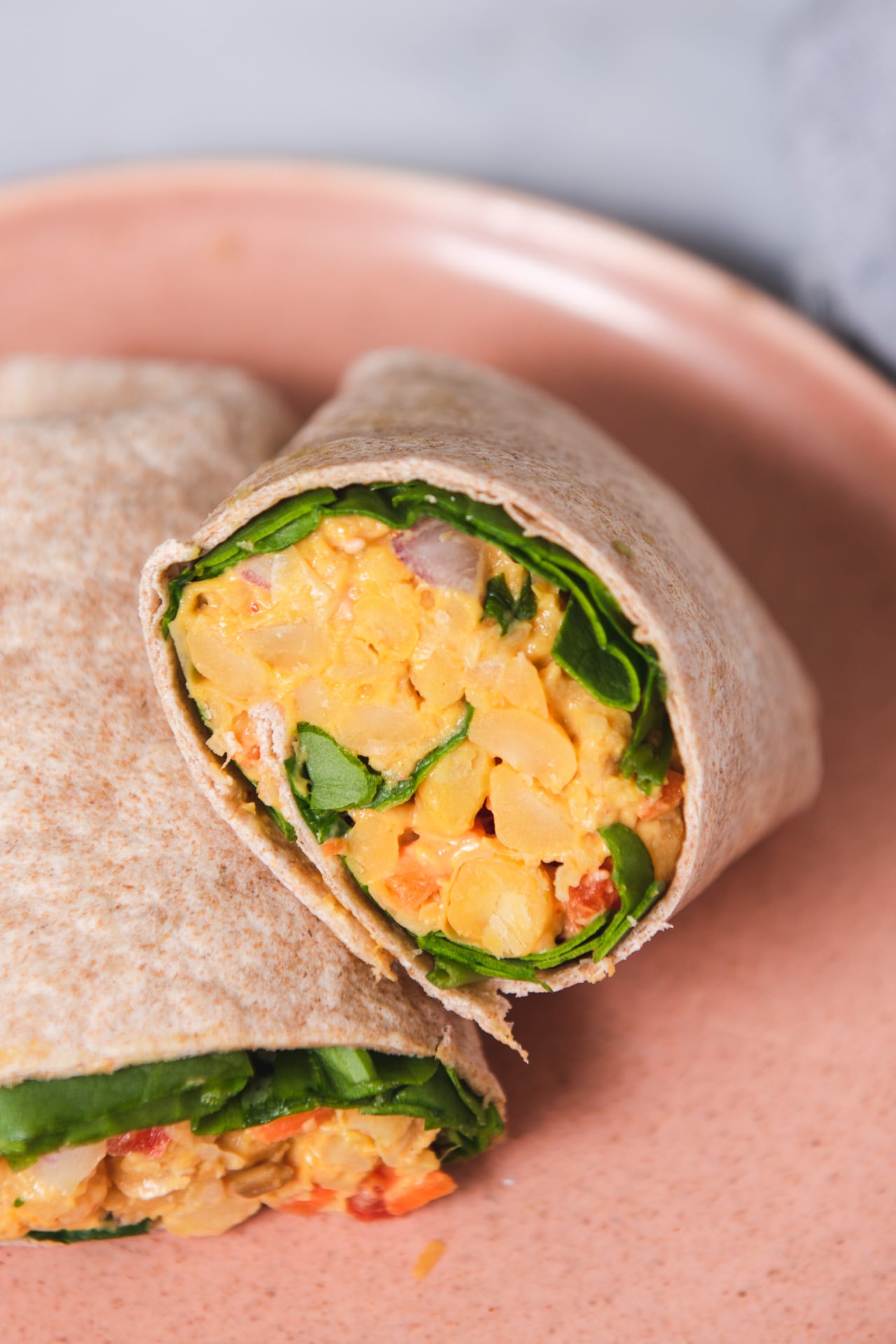 Close up of curry chickpeas in a wrap