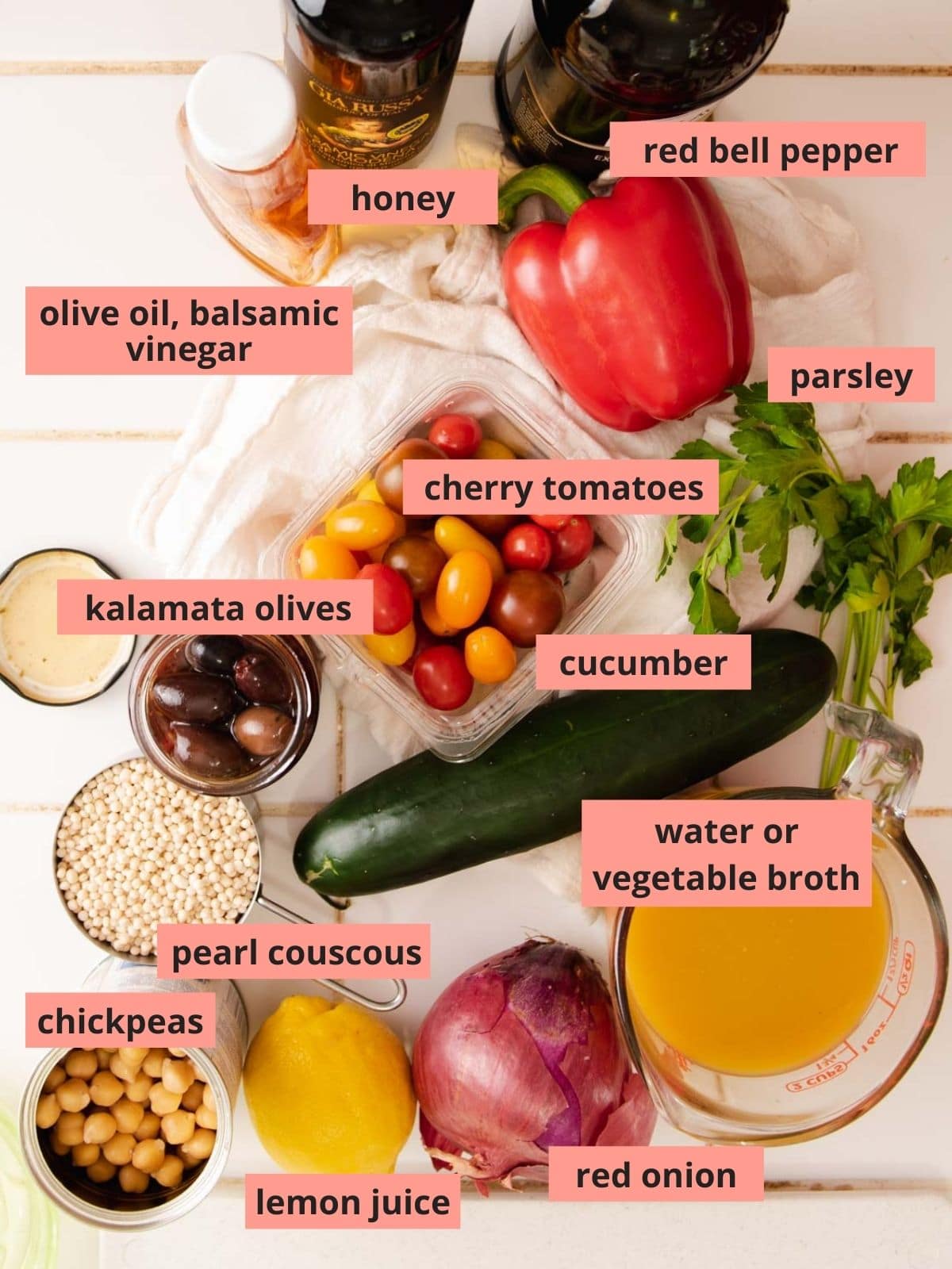 Labeled ingredients used to make couscous salad.
