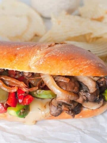 Close up of mushroom philly cheeset.eak with provolone cheese