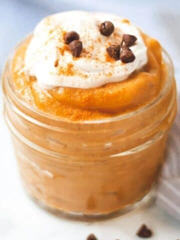 Pumpkin pudding in glass jar.