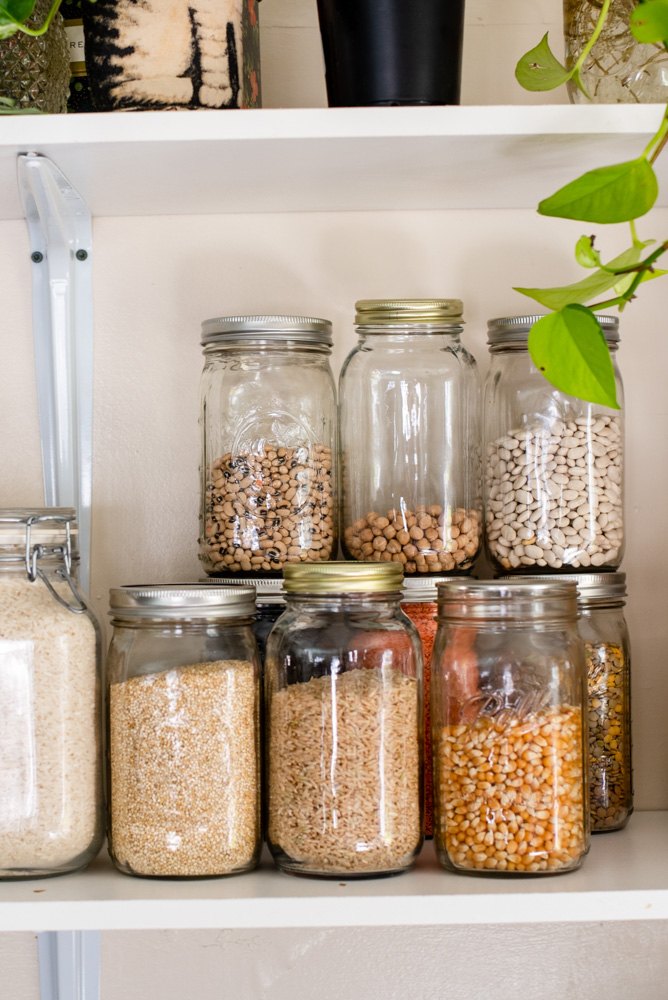 Quart sized glass jars filled with grains.