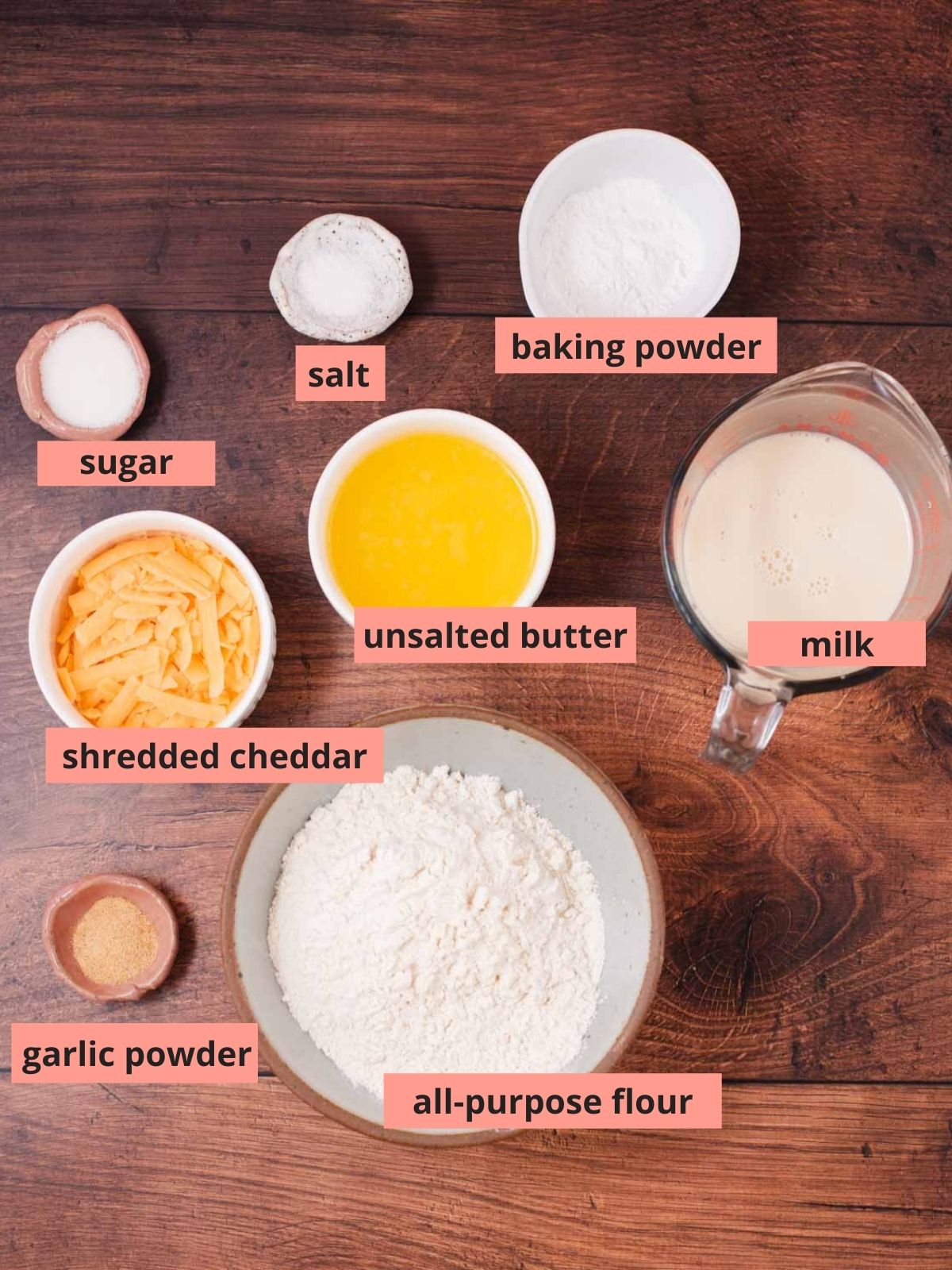 Labeled ingredients used to make cheddar drop biscuits