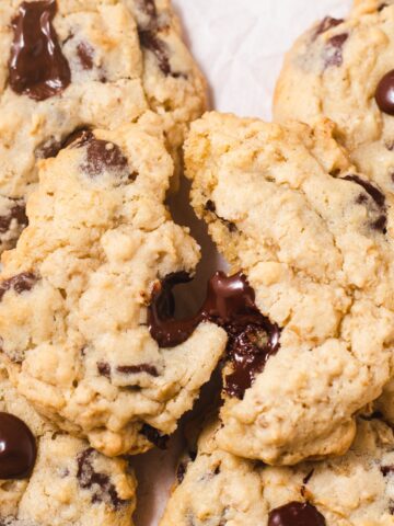 Split in half cookie on top of more cookies.