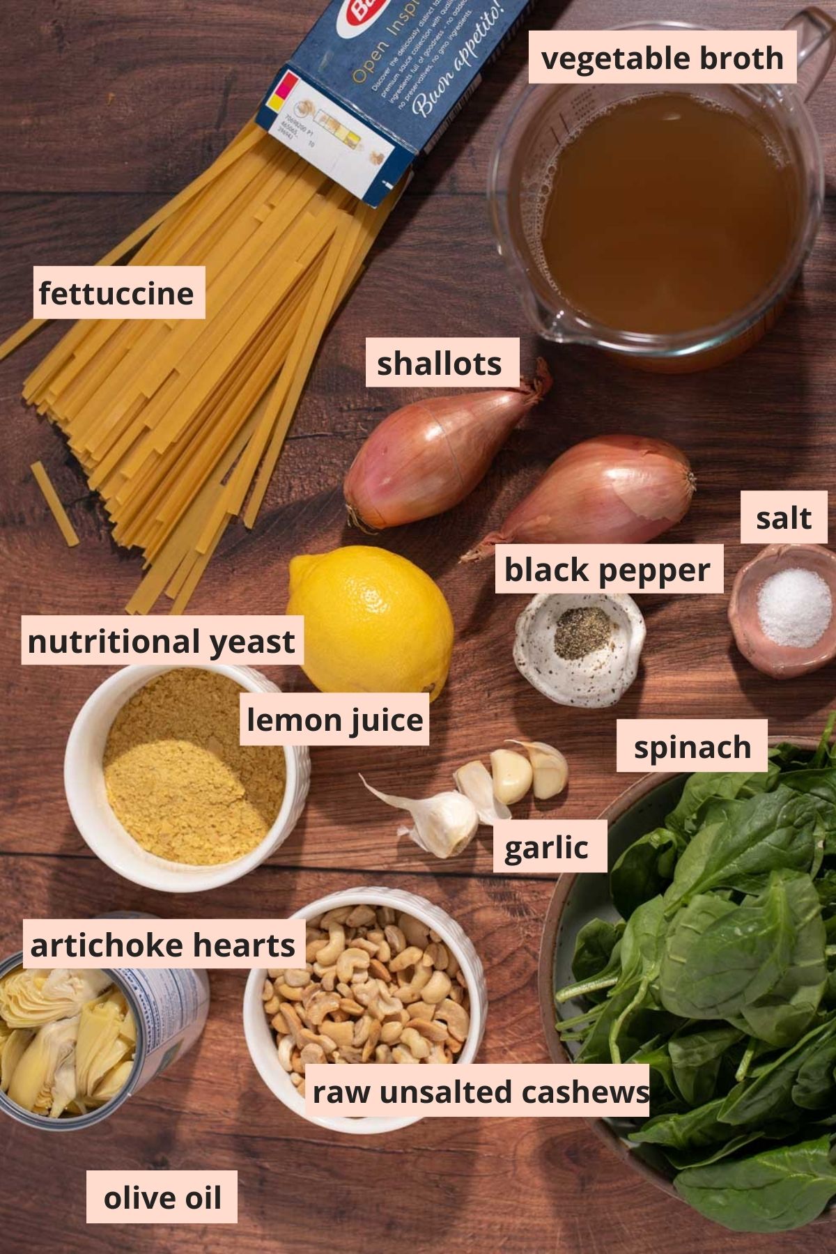 Labeled ingredients used to make spinach artichoke pasta