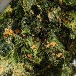 Close up of kale chips in a bowl.