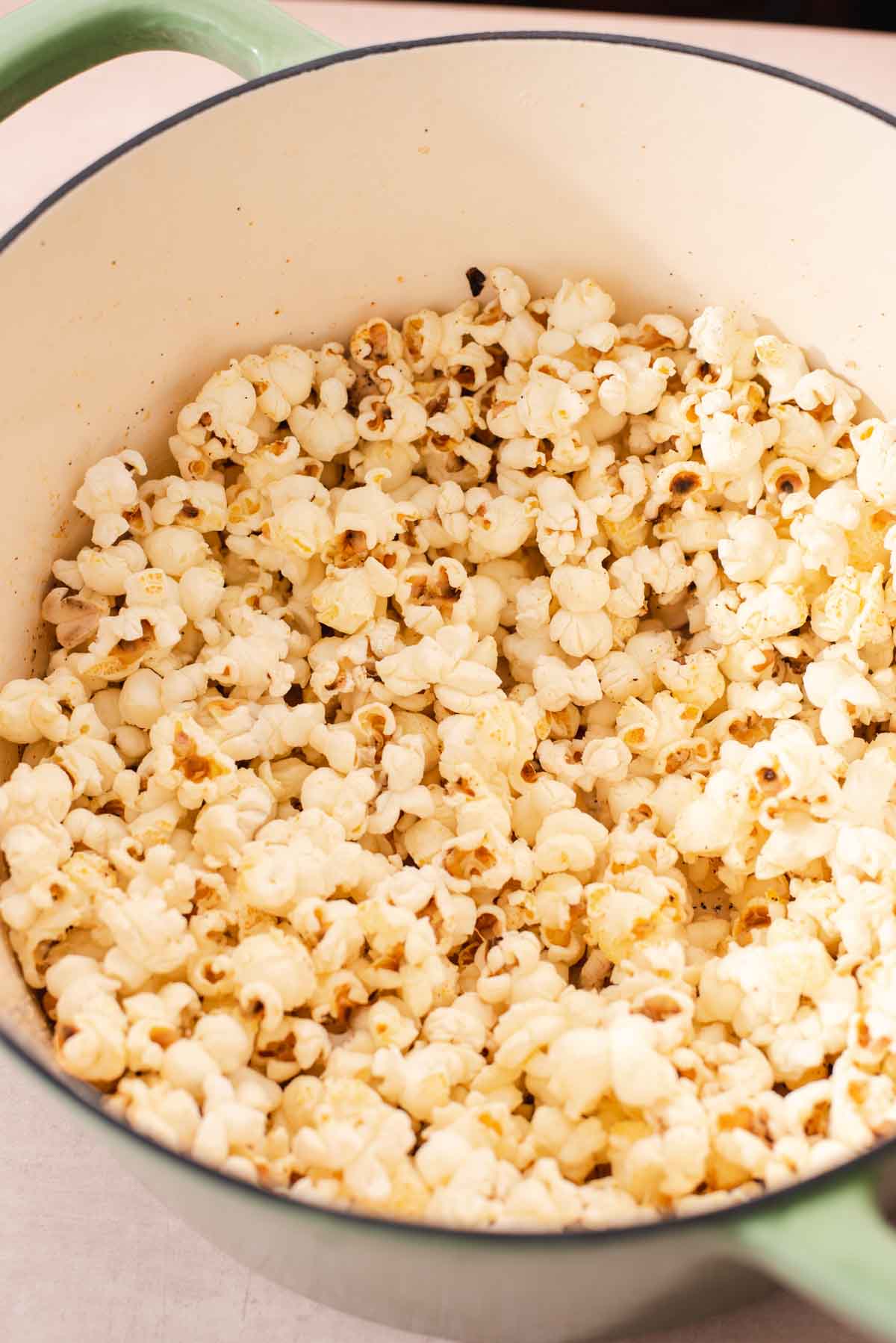 Close up of popcorn in a Dutch oven.