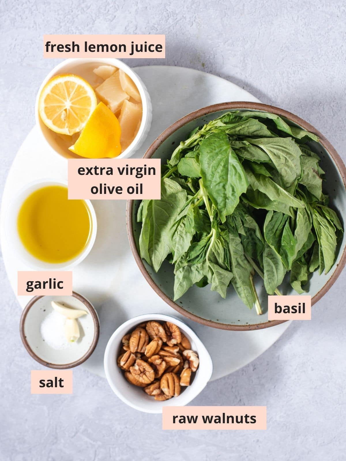 Labeled ingredients used to make pesto.