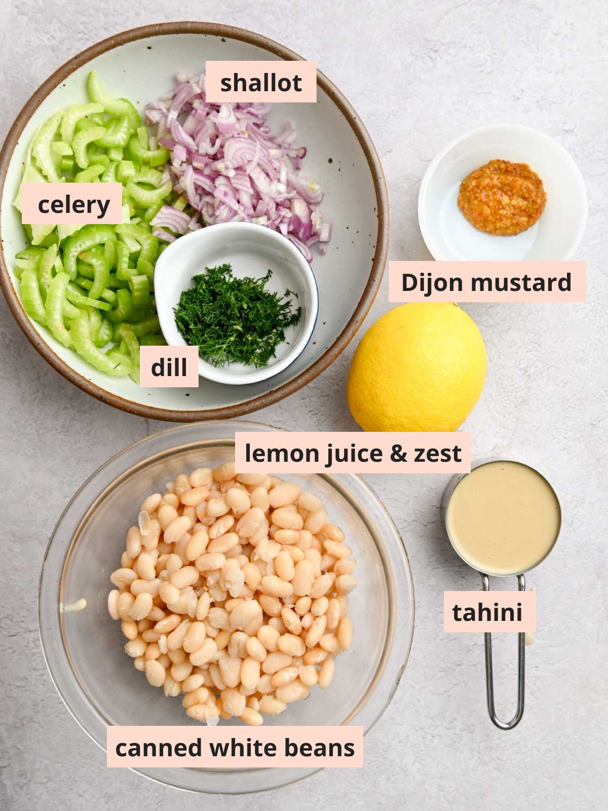 Labeled ingredients used to make white bean salad.