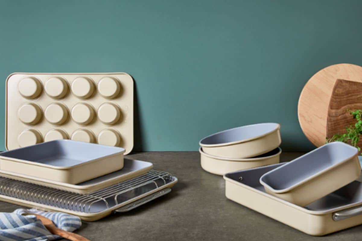 Caraway bakeware on a gray surface with a turquoise background.
