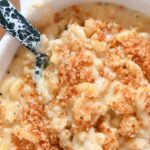 Close up of mac and cheese topped with toasted panko.