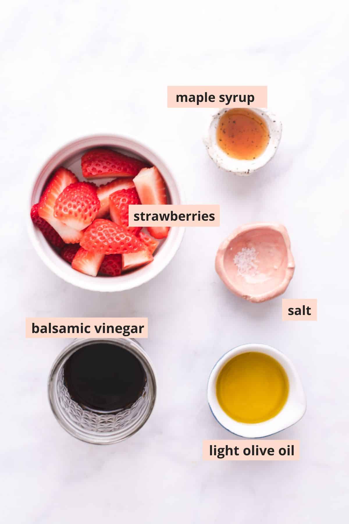 Labeled ingredients used to make strawberry vinaigrette.