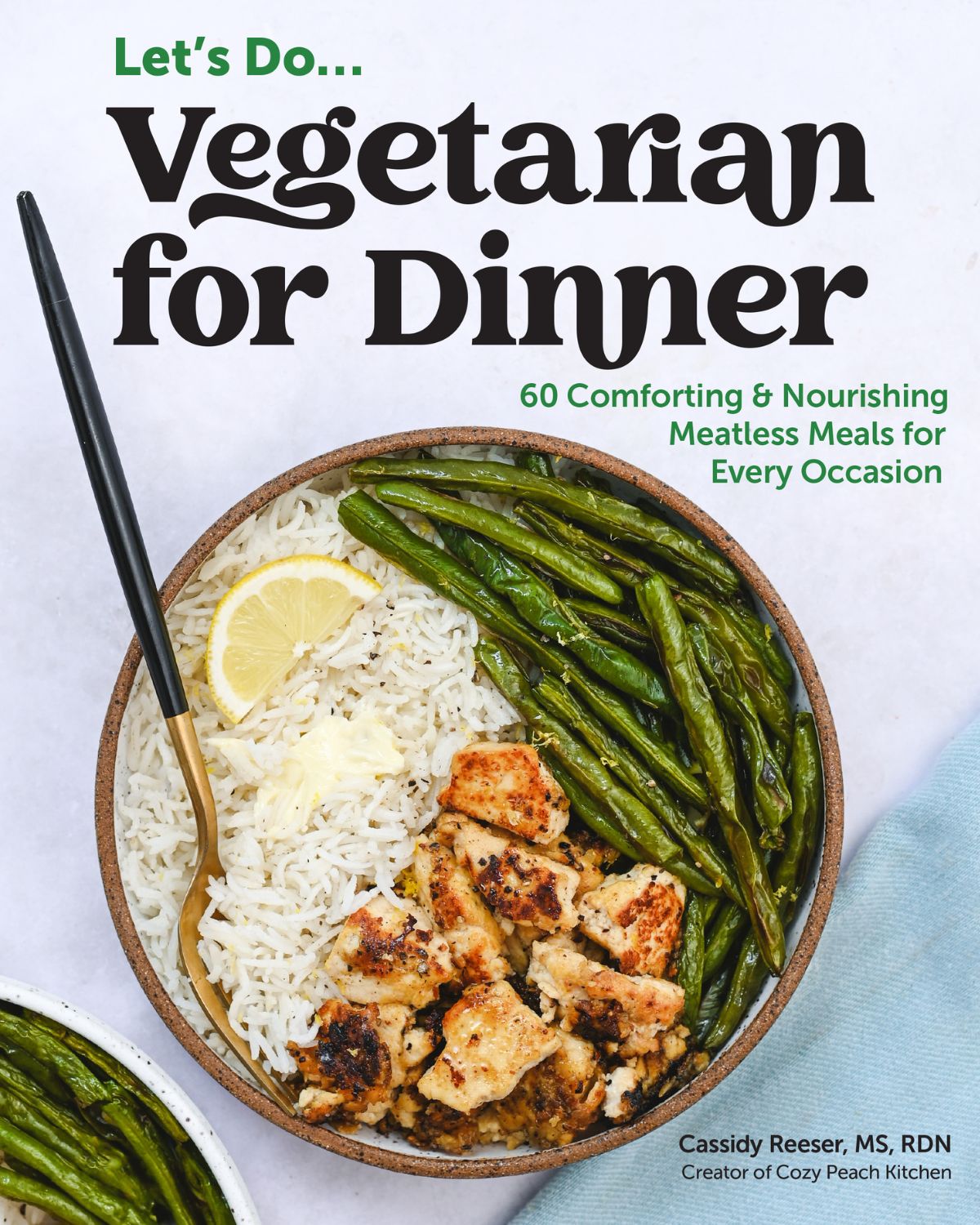 Cookbook cover showing a bowl with tofu, green beans, rice, with text reading "Vegetarian for Dinner" and book description.